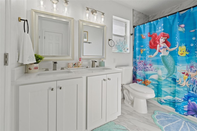 bathroom with toilet, vanity, and a shower with shower curtain