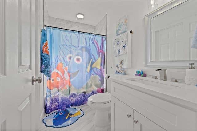 bathroom featuring toilet, a shower with curtain, and vanity