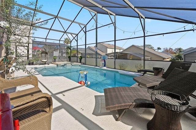 view of pool featuring a lanai and a patio area