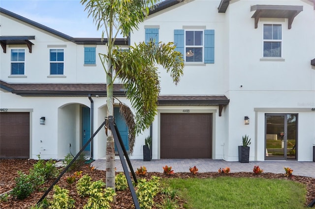 view of front of property featuring a garage