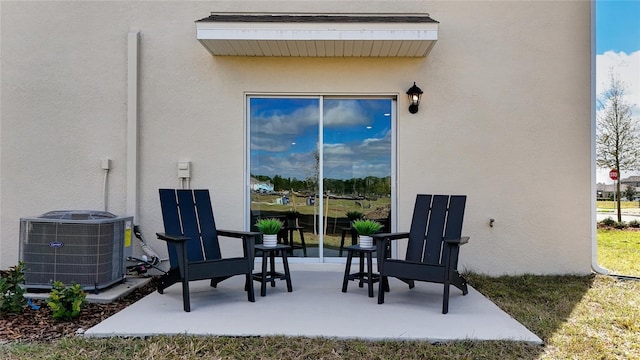 view of patio featuring central air condition unit