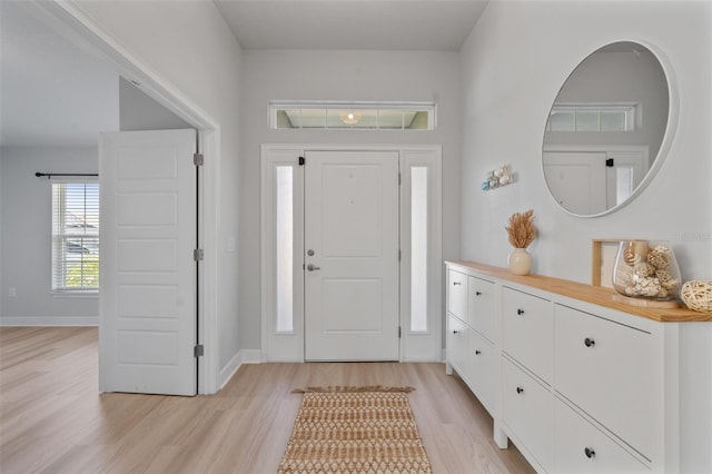 entrance foyer featuring light hardwood / wood-style floors