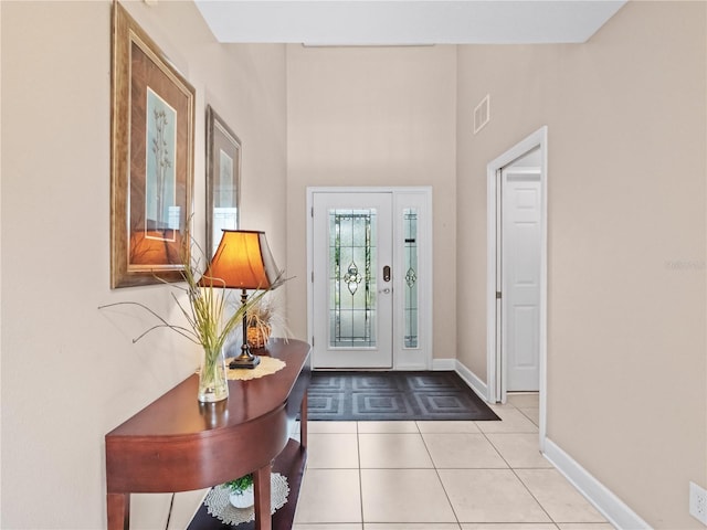 doorway featuring light tile patterned floors