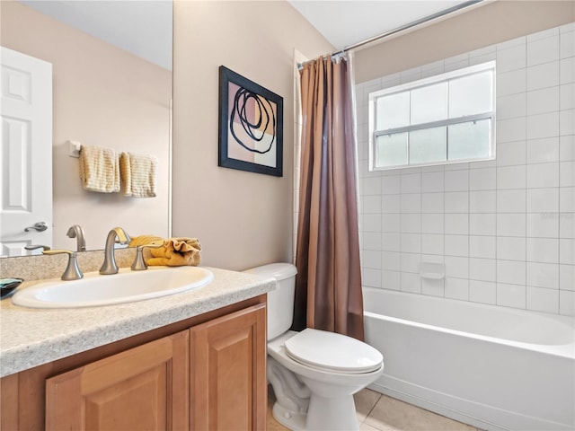 full bathroom featuring toilet, tile patterned floors, vanity, and shower / bath combo