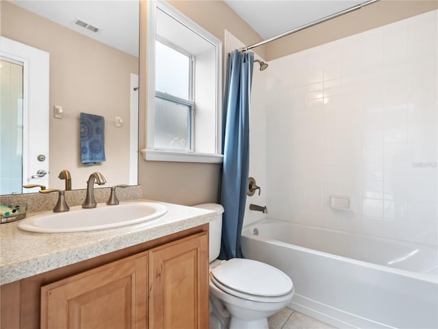 full bathroom with toilet, tile patterned flooring, shower / bath combo, and vanity