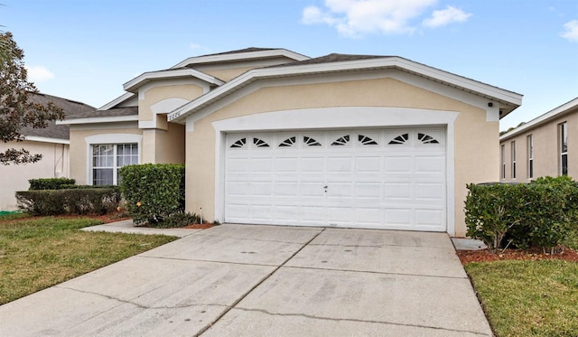 ranch-style home with a front lawn and a garage