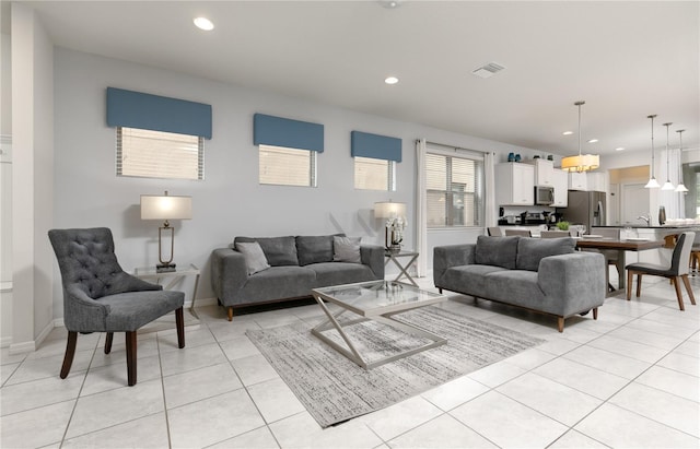 living room with light tile patterned floors