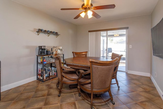 dining space with ceiling fan