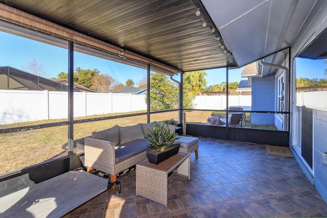 sunroom / solarium with plenty of natural light