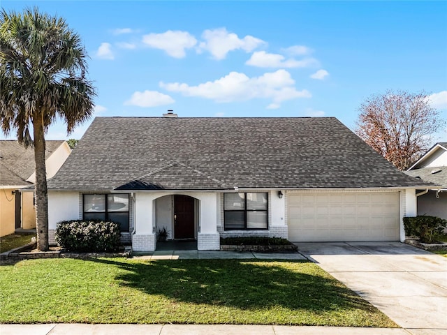 single story home featuring a front lawn and a garage