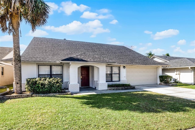 ranch-style house featuring a front yard and a garage