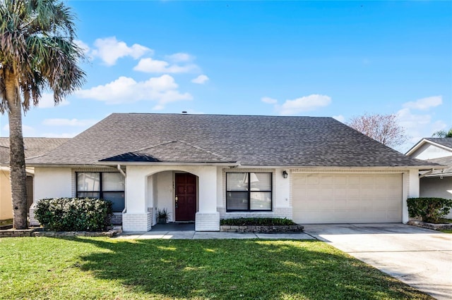 single story home featuring a front yard and a garage