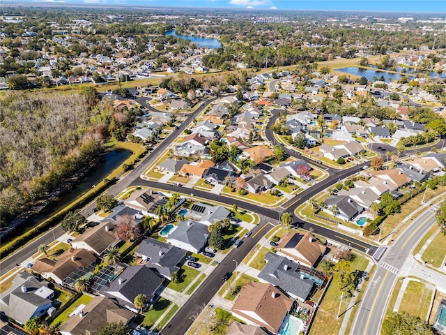 drone / aerial view featuring a water view