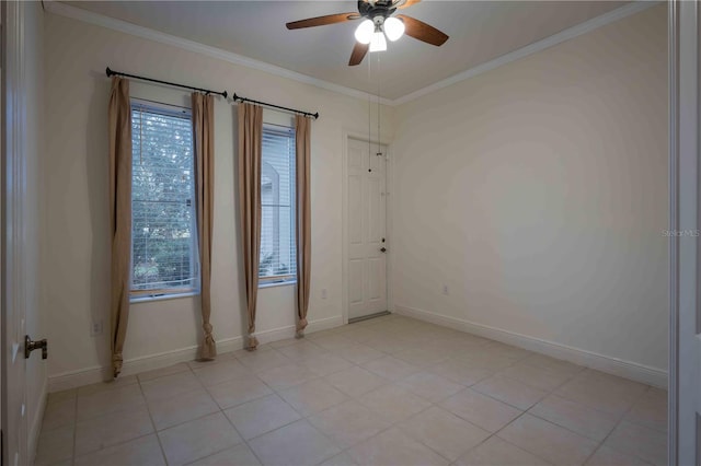 empty room featuring crown molding, ceiling fan, and light tile patterned flooring