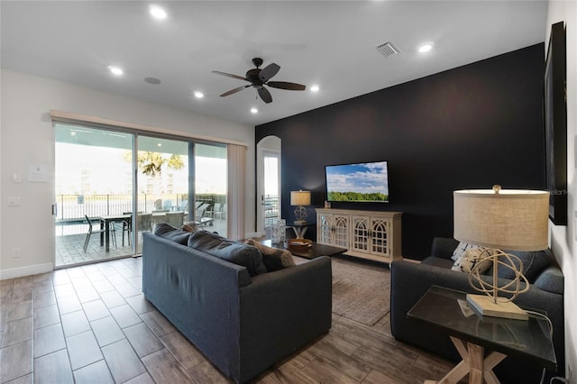 living room with ceiling fan