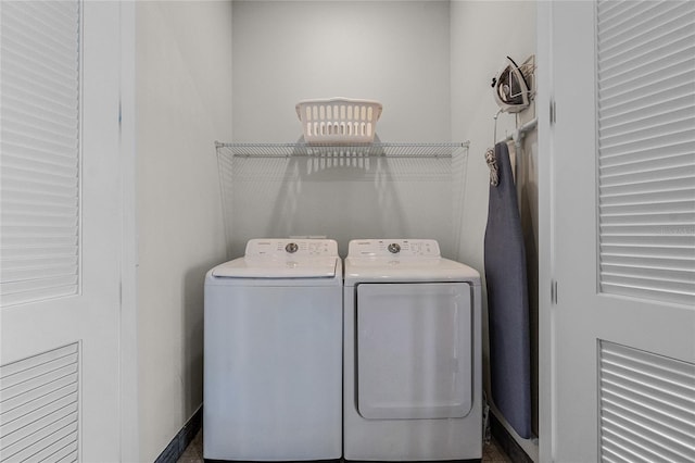 washroom with washer and clothes dryer