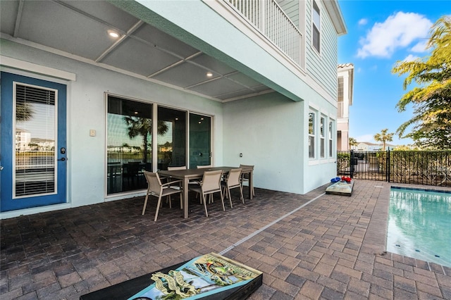 view of patio / terrace with a fenced in pool