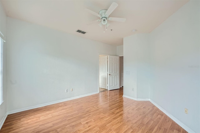 spare room featuring ceiling fan and light wood-type flooring