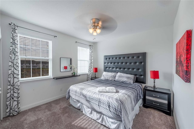 bedroom with ceiling fan and carpet floors