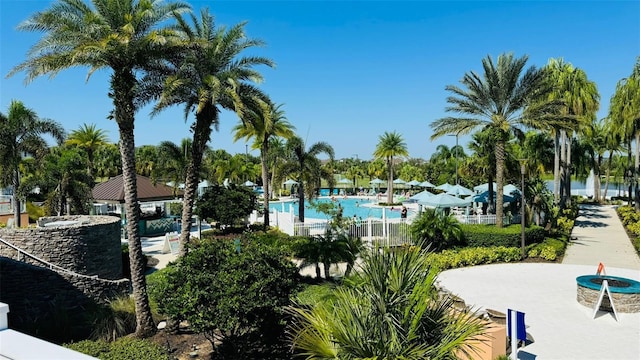 view of property's community featuring a swimming pool