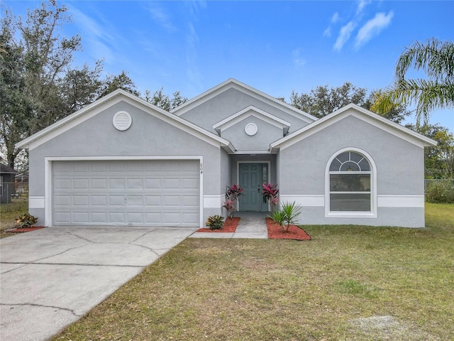 ranch-style home with a garage and a front yard