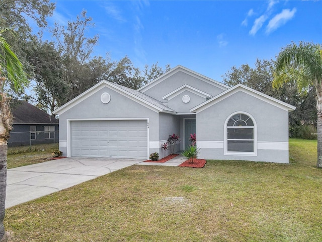 ranch-style house featuring a front yard and a garage