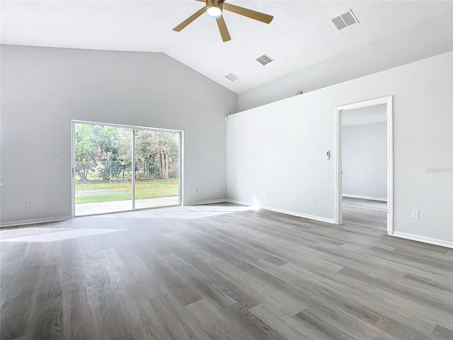 unfurnished room featuring ceiling fan, high vaulted ceiling, and hardwood / wood-style flooring