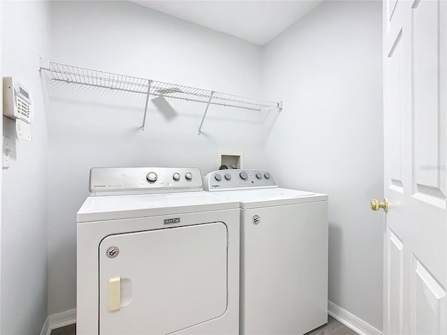 washroom featuring washer and dryer