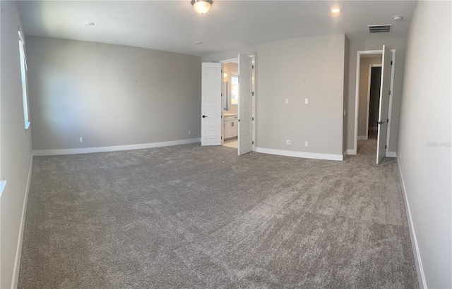 view of carpeted spare room