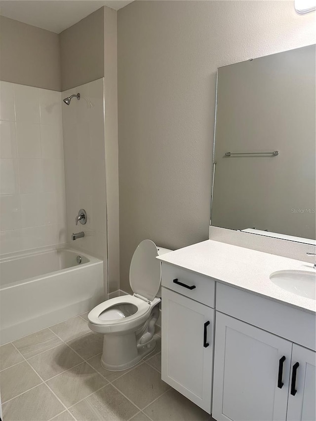 full bathroom with toilet, tile patterned flooring, shower / washtub combination, and vanity