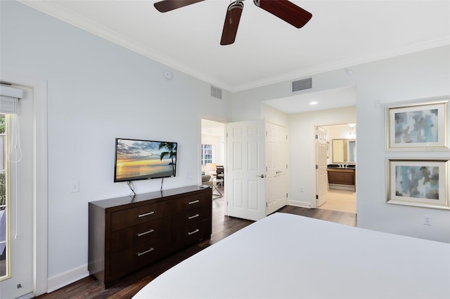 bedroom featuring ornamental molding, connected bathroom, ceiling fan, and dark hardwood / wood-style flooring