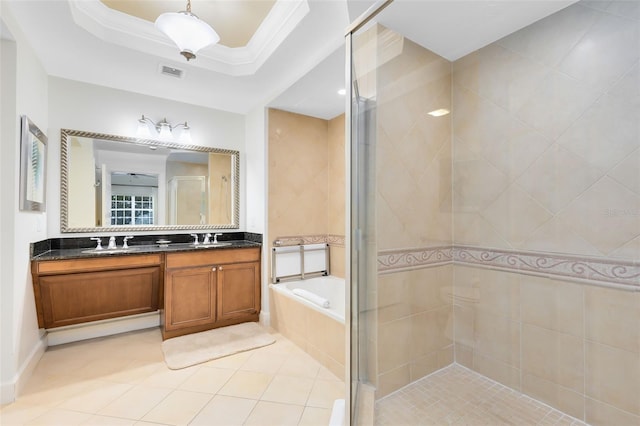 bathroom with independent shower and bath, ornamental molding, tile patterned floors, vanity, and a tray ceiling