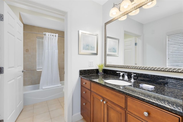 bathroom with tile patterned floors, vanity, and shower / bath combo