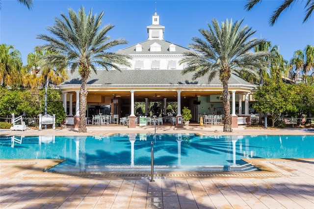 view of swimming pool with a patio area