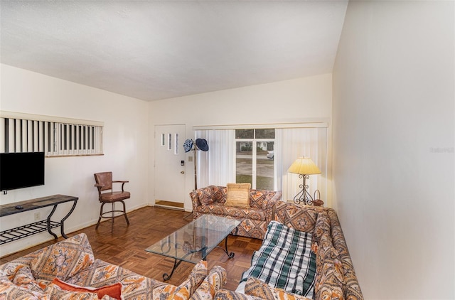 living room with dark parquet flooring