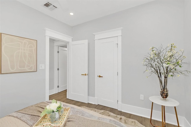 bedroom featuring hardwood / wood-style floors