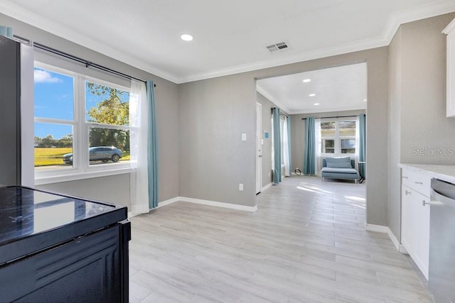 kitchen with white cabinetry, dishwasher, light hardwood / wood-style floors, and ornamental molding