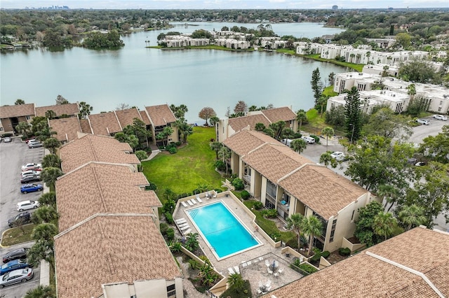 drone / aerial view with a water view