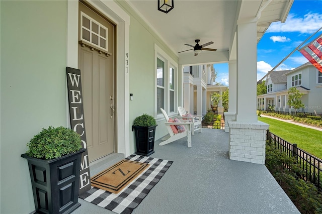 view of patio featuring covered porch and ceiling fan