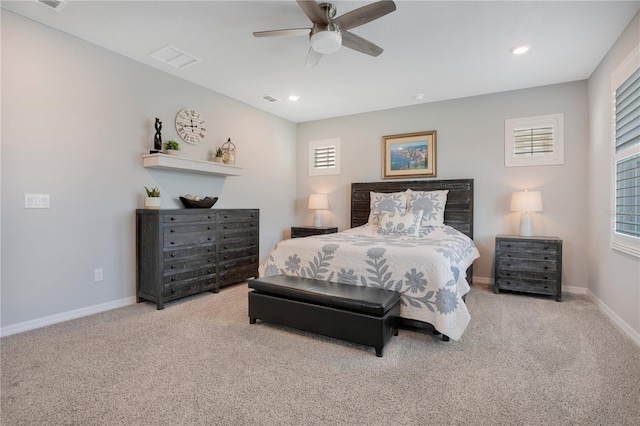 carpeted bedroom featuring ceiling fan