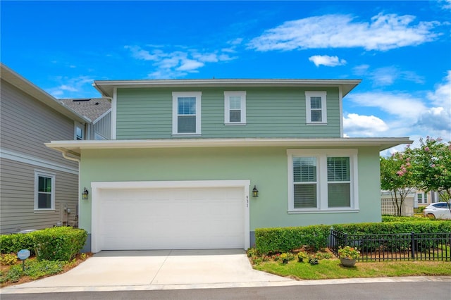 front of property featuring a garage