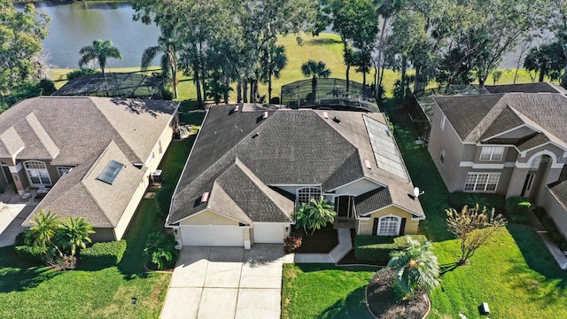 birds eye view of property featuring a water view