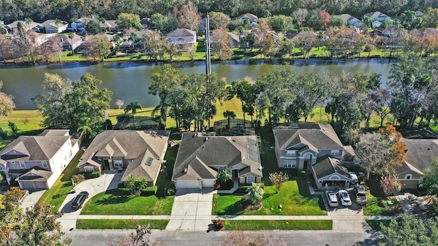 birds eye view of property featuring a water view