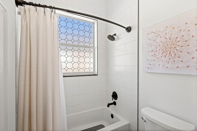 bathroom with toilet and shower / bathtub combination with curtain