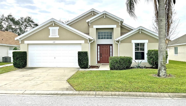 view of front of home featuring central AC unit, a front lawn, and a garage