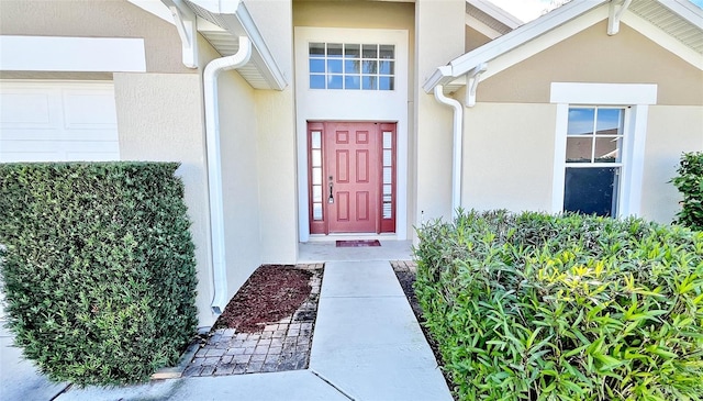 property entrance featuring a garage