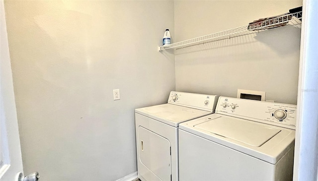 laundry room featuring washing machine and dryer