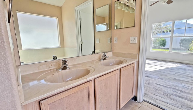 bathroom featuring tile patterned floors and vanity