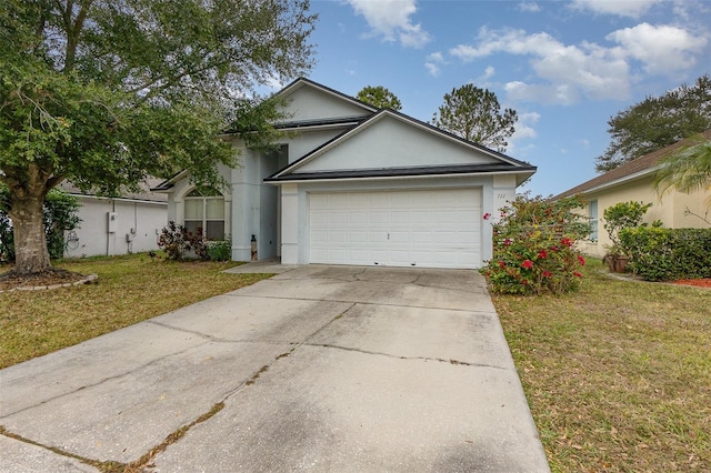 ranch-style home featuring a garage and a front lawn