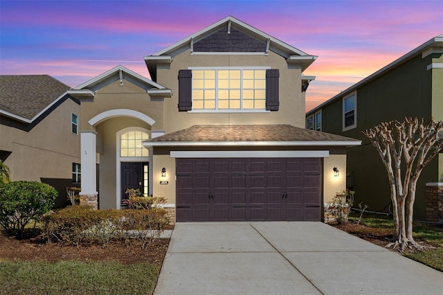 view of front of property featuring a garage